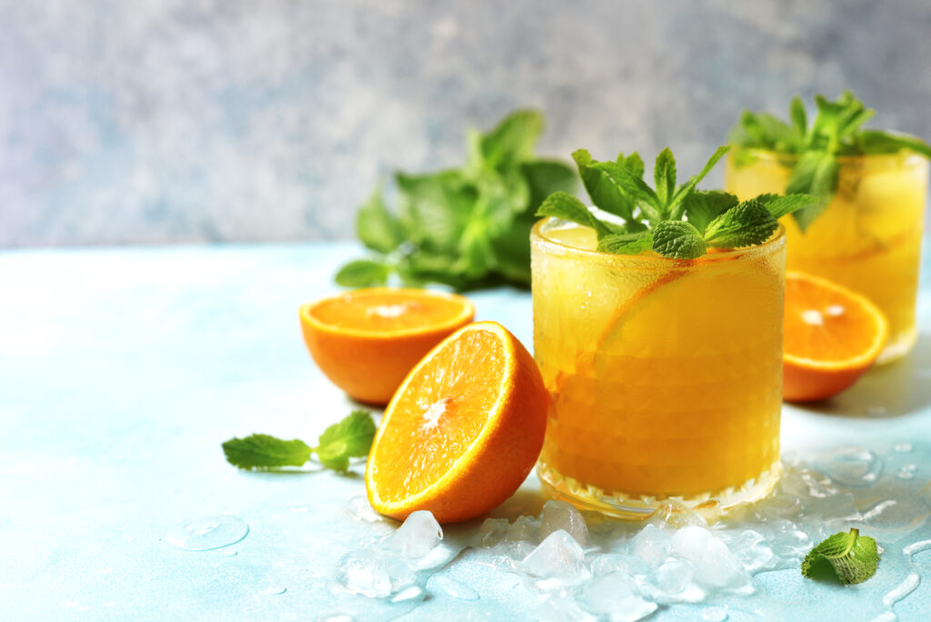 Cold summer orange lemonade with mint